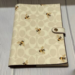 NWOT Coach Bee Pattern/signature C Cream  notebook.